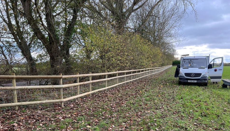 Post and rail fencing with stock net near Wantage, Oxfordshire